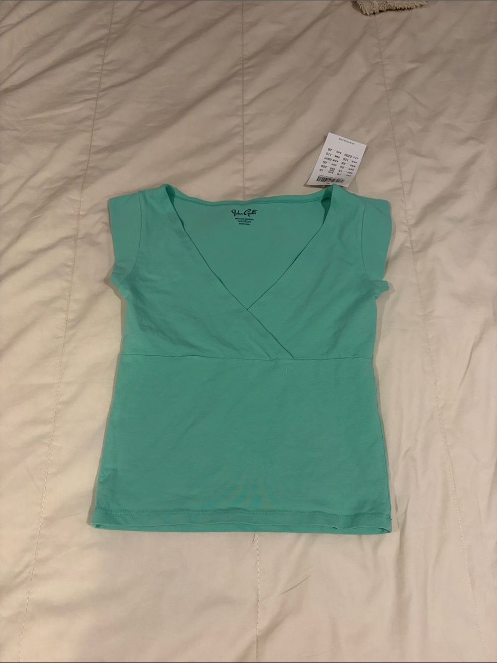 Brand melville teal Amara top. New with tags